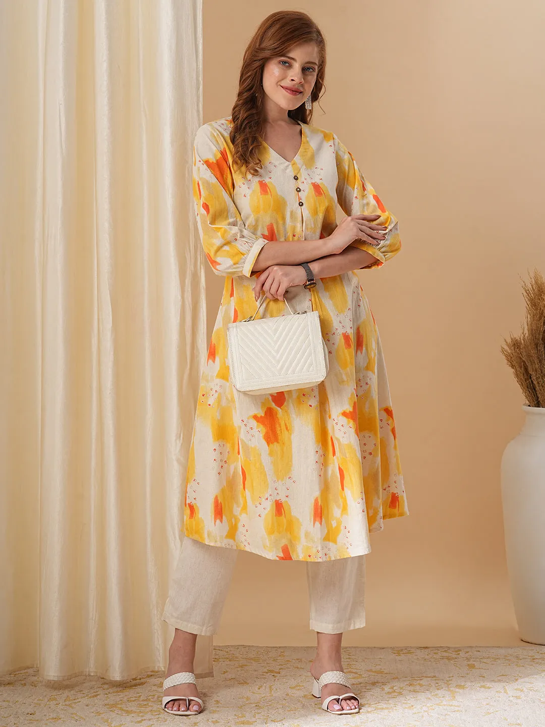 Abstract Printed A-Line Flared Kurta with Pant - Yellow