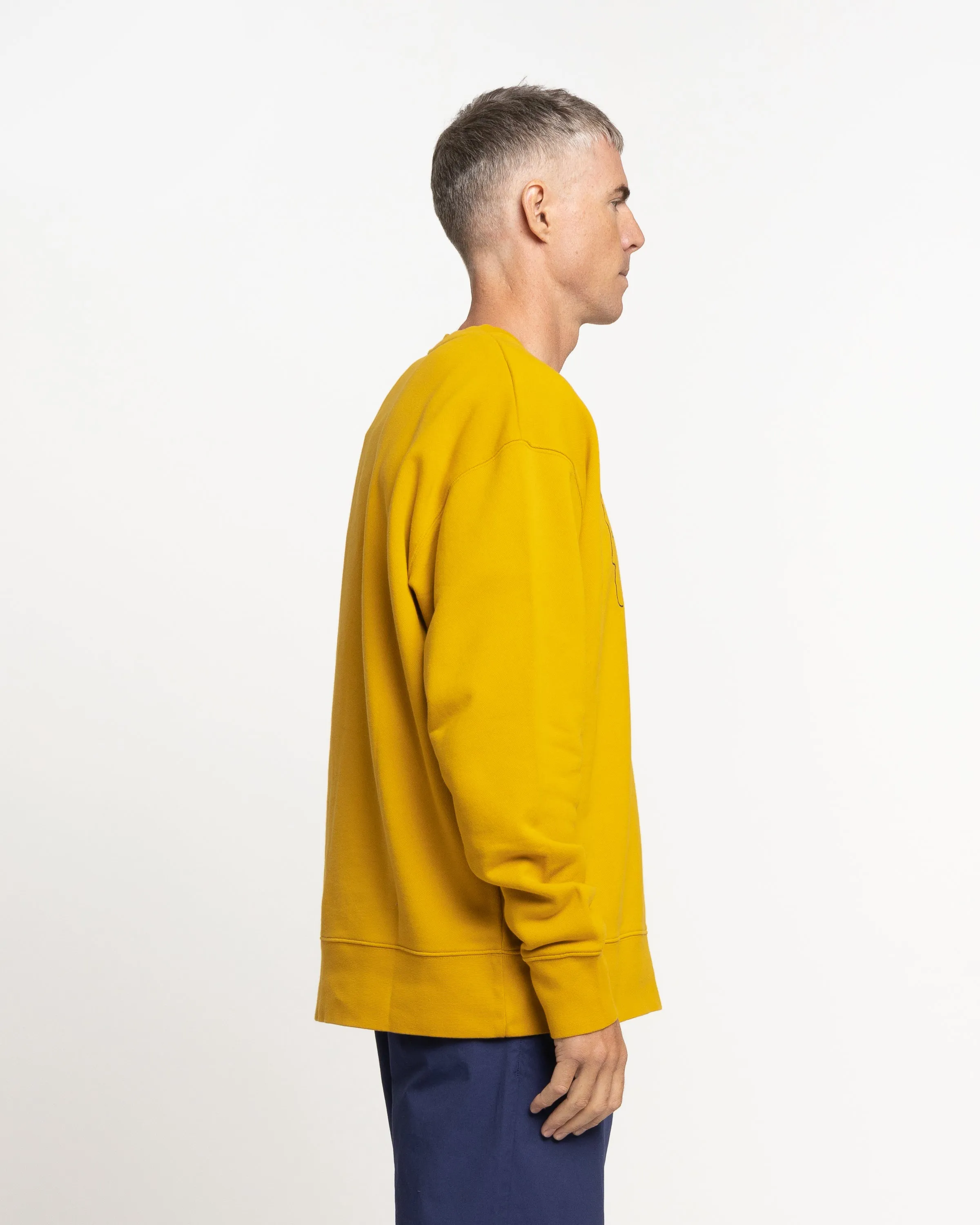 Norse Projects x GM Arne Faces Crewneck in Tumeric Yellow