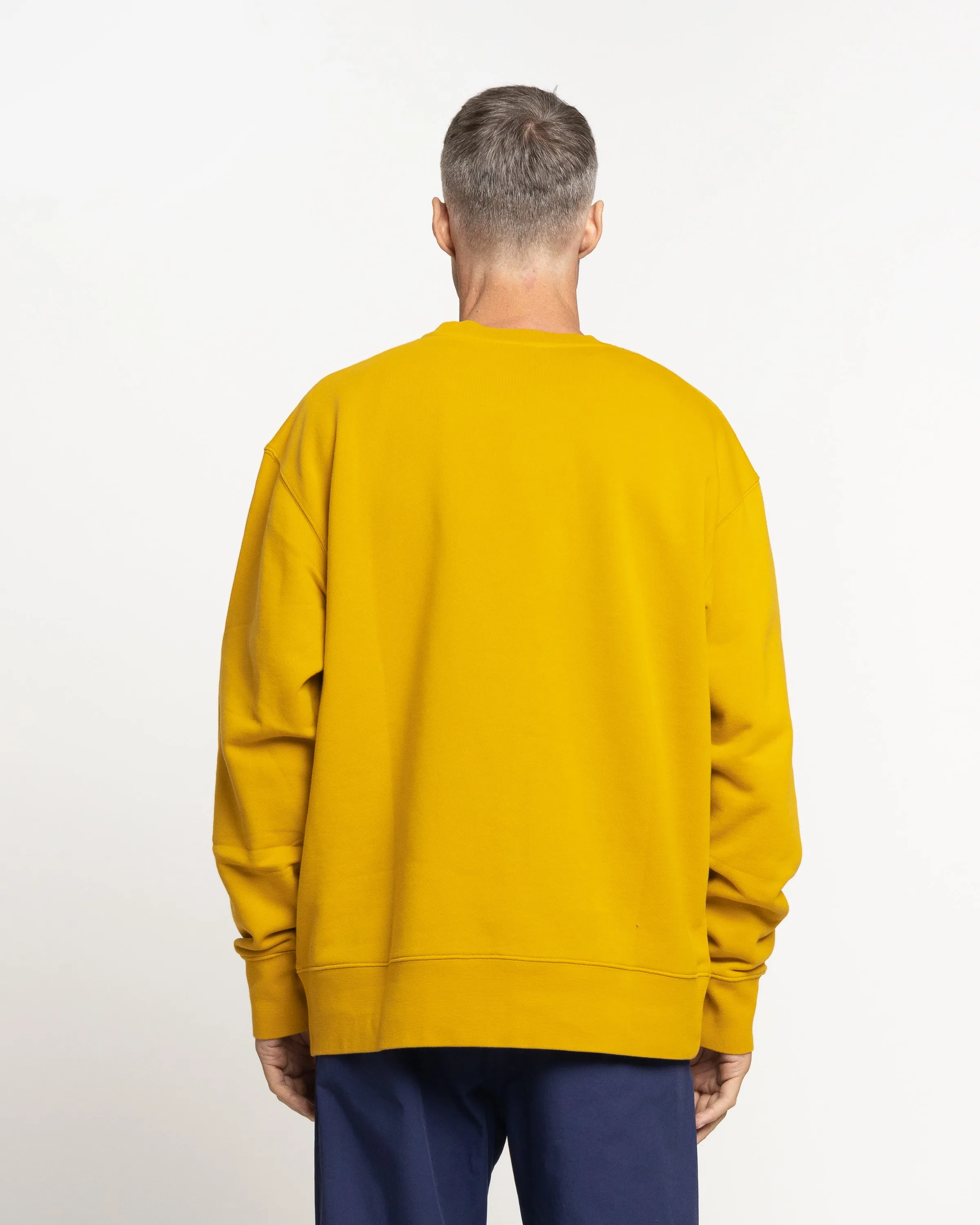 Norse Projects x GM Arne Faces Crewneck in Tumeric Yellow